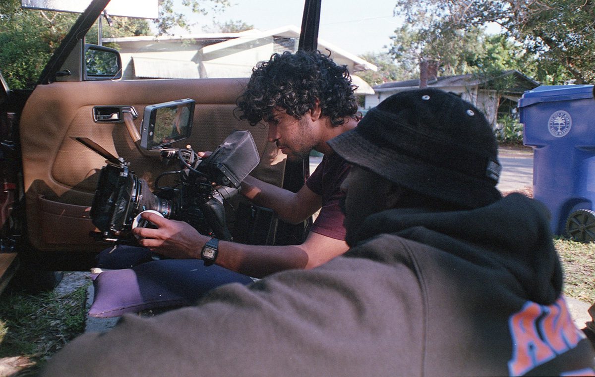 Karim Dakkon, behind the camera, working on set.